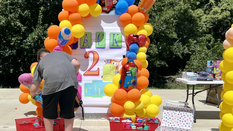 Kids from more than a dozen local group homes attended a back-to-school event on Saturday where they were provided with backpacks and school supplies ahead of the upcoming school year. AIMEE HANCOCK/STAFF