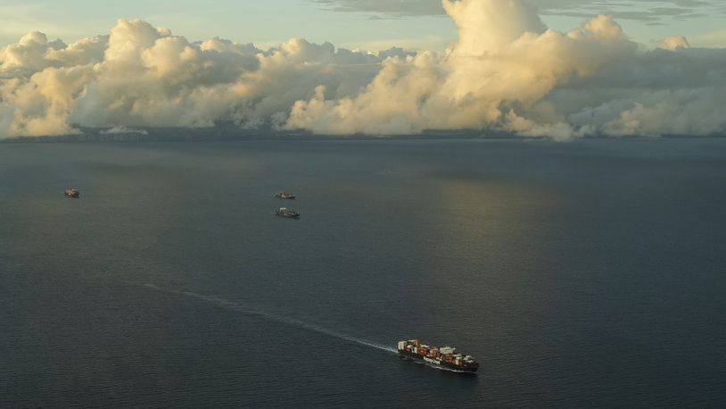 FILE - A cargo ship sails toward the Pacific Ocean waiting to transit the Panama Canal in Panama City, June 28, 2024. (AP Photo/Matias Delacroix, File)