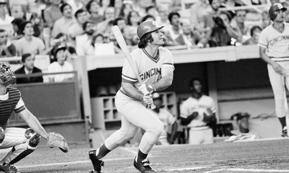 FILE - Cincinnati Reds' Pete Rose flies out in the first inning of a baseball game against the New York Mets, July 24, 1978, at New York's Shea Stadium. Rose agreed to a lifetime ban in 1989 after an investigation for Major League Baseball by lawyer John Dowd found the all-time hit leader placed bets on the Reds to win from 1985-87 while playing for and managing the team. (AP Photo/G. Paul Burnett, File)