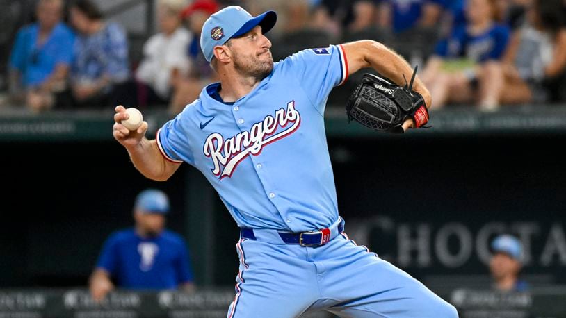 Texas Rangers starting pitcher Max Scherzer throws in his first baseball game back from the injury list in the first inning against the Kansas City Royals, Sunday, June 23, 2024, in Arlington, Texas. (AP Photo/Albert Pena)