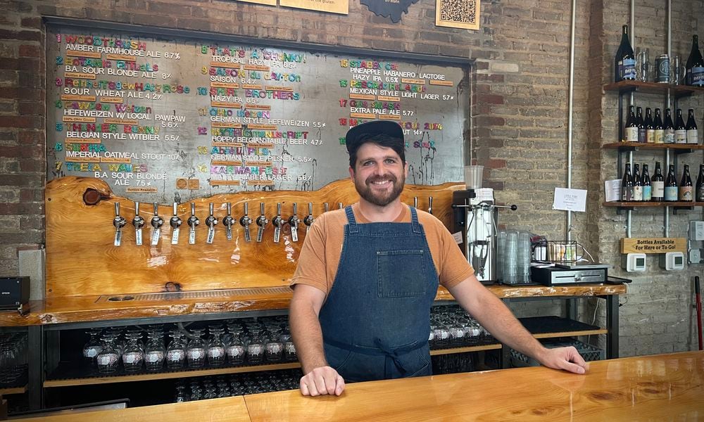 Zach Morgan is the executive chef and general manager of Little Fish Brewing Company in Dayton. NATALIE JONES/STAFF