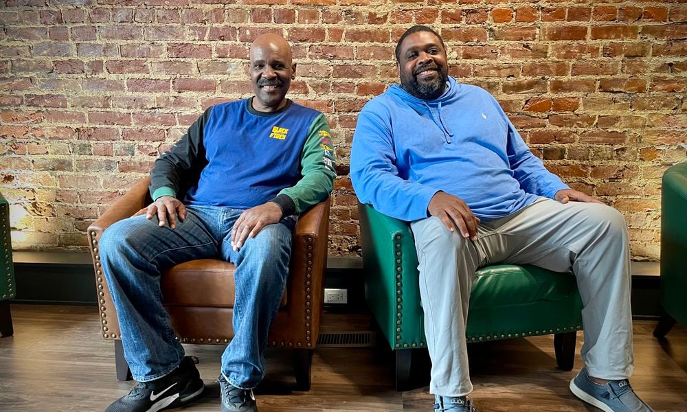 Dallas Webster and Jeff Jackson (left to right), neighbors for 15 years, are investing in their community by opening a cigar shoppe and lounge in Daytons Wright Dunbar Business District. NATALIE JONES/STAFF