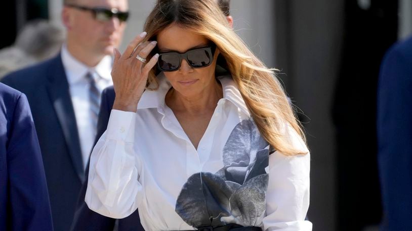 FILE - Former first lady Melania Trump leaves after voting in the Florida primary election in Palm Beach, Fla., March 19, 2024. After Melania Trump missed key events in her husband's campaign, she told reporters asking about her thin schedule to “stay tuned.” But in the months since, she has largely refrained from public appearances. (AP Photo/Wilfredo Lee, File)