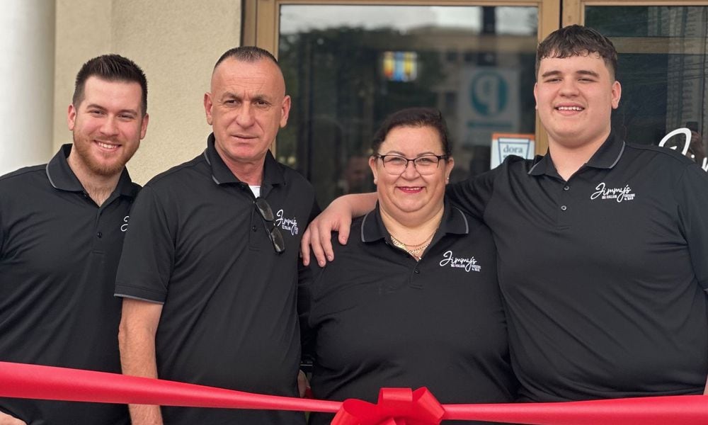 The Jusufi Family at the grand opening of their Jimmys Italian restaurant in the Oregon District in May 2024. They are (left to right) son Albert, a recent Wright State grad; parents Mo and Mira; son Doni, a Fairmont High junior who wrestles for the Firebirds. CONTRIBUTED