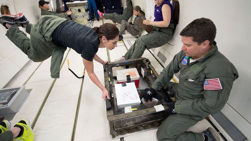 Researchers gather data for their foam experiment during a parabolic flight in 2015. Join Scott Rhoades, chief nursing officer from the Center for Aerospace Nursing Excellence, Sept. 24 at the National Museum of the U.S. Air Force as he makes two special presentations describing his experience with freefall aboard a parabolic flight, such as those used to train astronauts. The first presentation will begin at 11 a.m. and will repeat at 1:30 p.m. (NASA photo/James Blair)