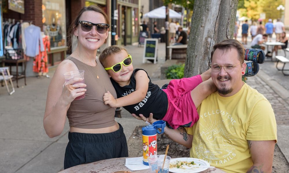 Taste of the Oregon District happened on Fifth Street on Saturday, Sept. 14, 2024. Attendees purchased tickets to sample snack-size portions of signature dishes from Oregon District restaurants. TOM GILLIAM / CONTRIBUTING PHOTOGRAPHER