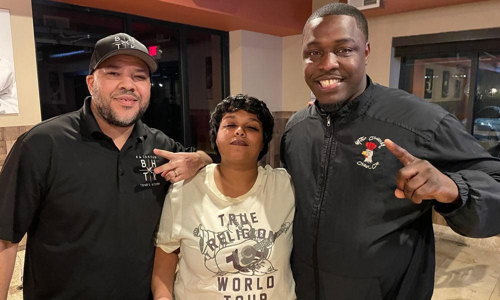 The Wing Warz Competition is from 2 to 7 p.m. at Bleachers Sport Bar and Grill, located at 4317 Linden Ave. in Riverside. Pictured (left to right) is Anthony Mitchell, Devanna Washington and Michael Baxter. NATALIE JONES/STAFF