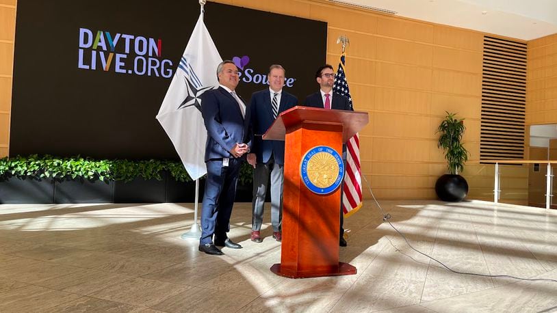 U.S. Rep. Mike Turner, R-Dayton, center, after discussing plans Wednesday for next May's expected NATO Spring Parliamentary Assembly visit to Dayton. On Turner's right: Erhardt Preitauer, president and CEO of CareSource. On his left, Gabriel van Aalst, president and CEO of Dayton Live. THOMAS GNAU/STAFF