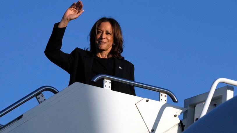 Democratic presidential nominee Vice President Kamala Harris boards Air Force Two at Charlotte Douglas International Airport, Saturday, October 5, 2024, in Charlotte, N.C., after a briefing on the damage from Hurricane Helene. (AP Photo/Chris Carlson)