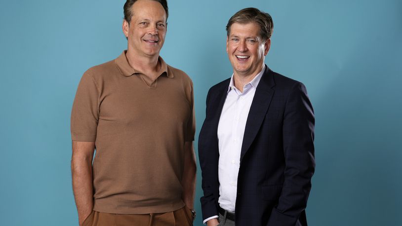 Actor-executive producer Vince Vaughn, left, and creator-executive producer Bill Lawrence, of the Apple TV+ series "Bad Monkey," pose for a portrait at the Four Seasons Hotel, Tuesday, Aug. 6, 2024, in Los Angeles. (AP Photo/Chris Pizzello)