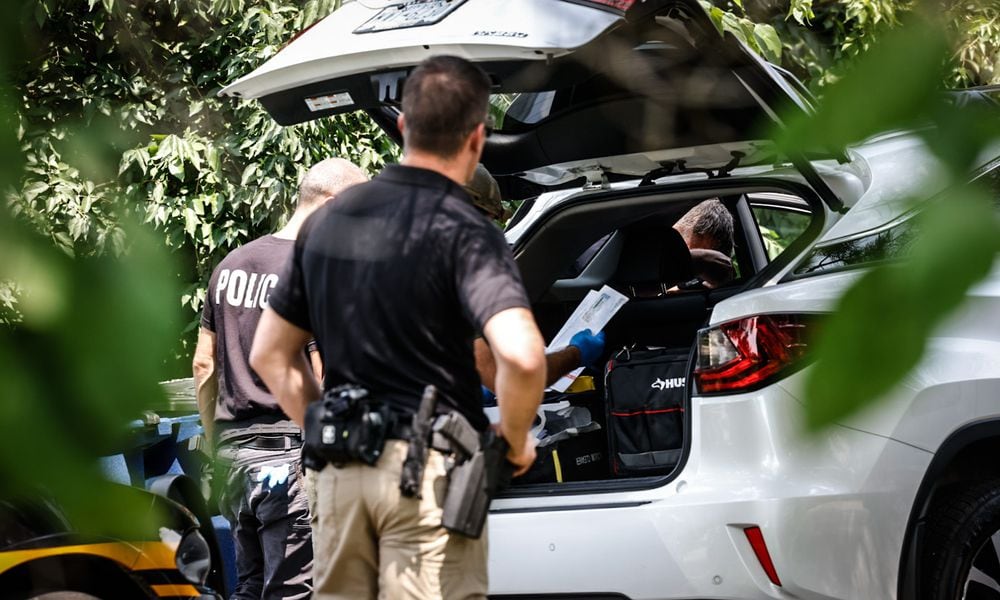 Homeland Security Investigations and Dayton police were outside a residence in the 1100 block of Irving Avenue as part of a federal investigation into allegations of financial crimes and labor exploitation. Search warrants were served at Fuyao Glass America and 27 other locations in the region on Friday, July 26, 2024, as part of the investigation. JIM NOELKER / STAFF