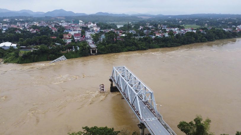 A bridge collapse due to floods triggered by typhoon Yagi in Phu Tho province, Vietnam on Monday, Sept. 9, 2024 (Bui Van Lanh/ VNA via AP)