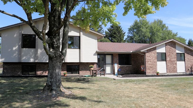 Sitting on just under a half-acre, the brick-and-vinyl home at 973 Princewood Ave. in Washington Twp. has about 3,171 square feet of living space. Listed for $399,996 by Berkshire Hathaway Home Professional Services, the property includes a two-car garage, a paver-brick walkway that wraps around to the paver patio and deep fenced back yard.  CONTRIBUTED