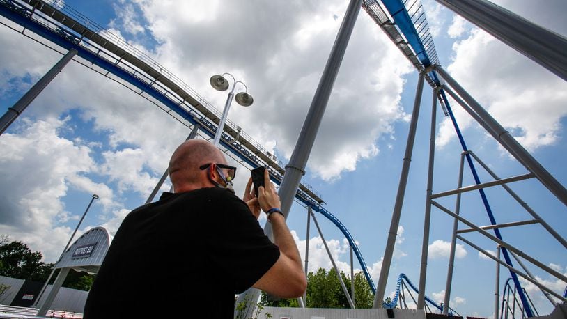 Coaster enthusiast Jared Ream rides the new Orion giga coaster on July 1 at Kings Island in Mason. Ream lost 190 pounds, motivated by his desire to ride this coaster. NICK GRAHAM/STAFF