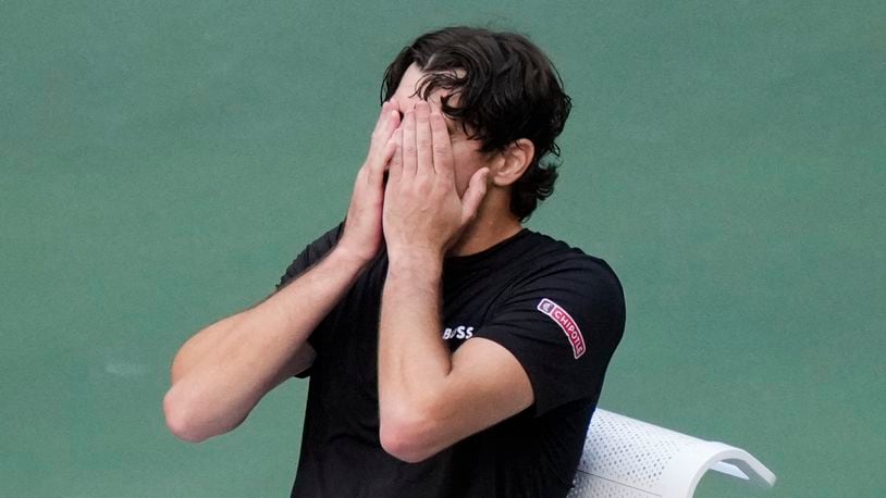 Taylor Fritz, of the United States, reacts after being defeated by Jannik Sinner, of Italy, in the men's singles final of the U.S. Open tennis championships, Sunday, Sept. 8, in New York. 2024. (AP Photo/Frank Franklin II)