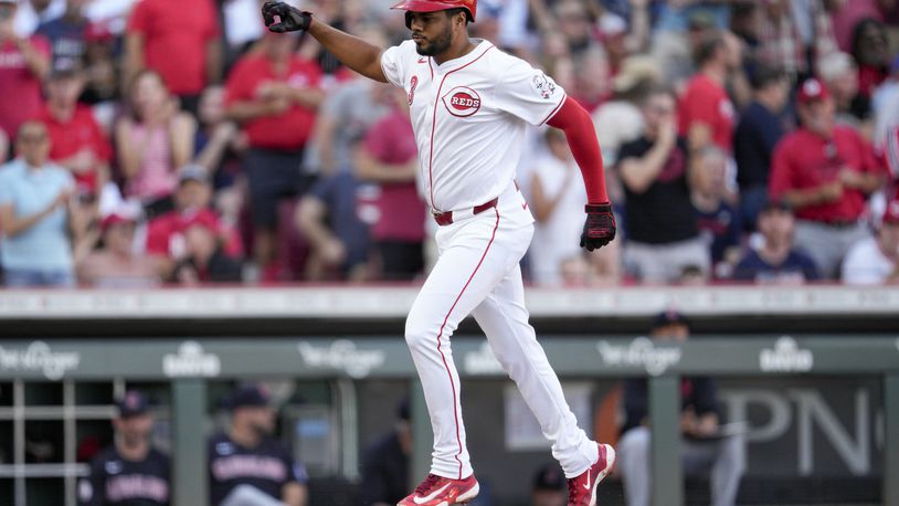 Cincinnati Reds' Jeimer Candelario runs the bases after hitting a solo home run against the Cleveland Guardians during the first inning of a baseball game in Cincinnati, Wednesday, June 12, 2024. (AP Photo/Jeff Dean)