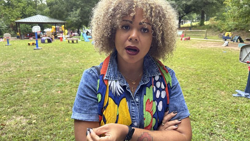 Claudia De la Cruz, the Party for Socialism and Liberation's 2024 presidential nominee, speaks during an interview on Friday, Sept. 13, 2024, in a park in Decatur, Ga. (AP Photo/Jeff Amy)