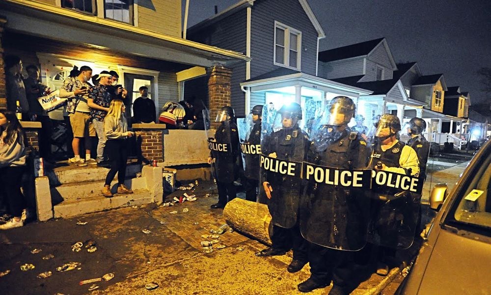 In 2020, University of Dayton Police and city of Dayton police dispersed a large crowd of disorderly students during a street party where about 1,000 students gathered. Authorities say students threw bottles and damaged vehicles during the incident. MARSHALL GORBY/ STAFF