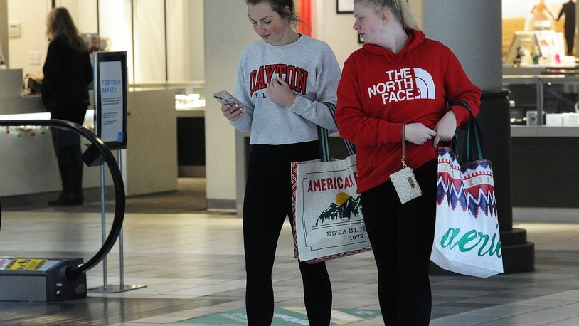 Jillian McIntosh, left and Courtney Furnas, shop at the Dayton Mall in this file photo. This year’s sales tax holiday — running for 10 days from midnight on July 30 to a minute before midnight on Aug. 8 — will feature a considerably longer list of purchases eligible for sales tax relief. MARSHALL GORBY\STAFF