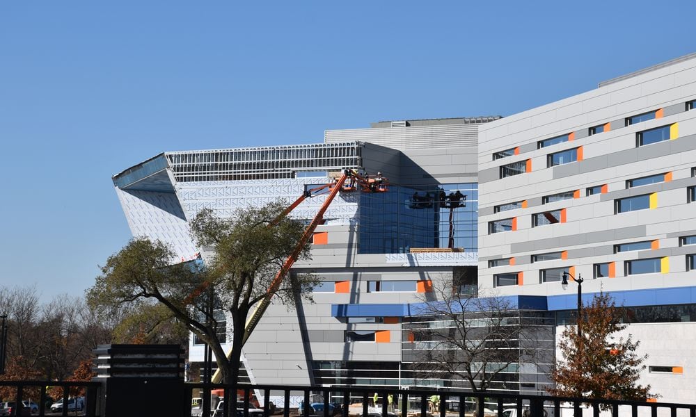 The Greater Dayton School across from RiverScape MetroPark remains under construction. CORNELIUS FROLIK / STAFF