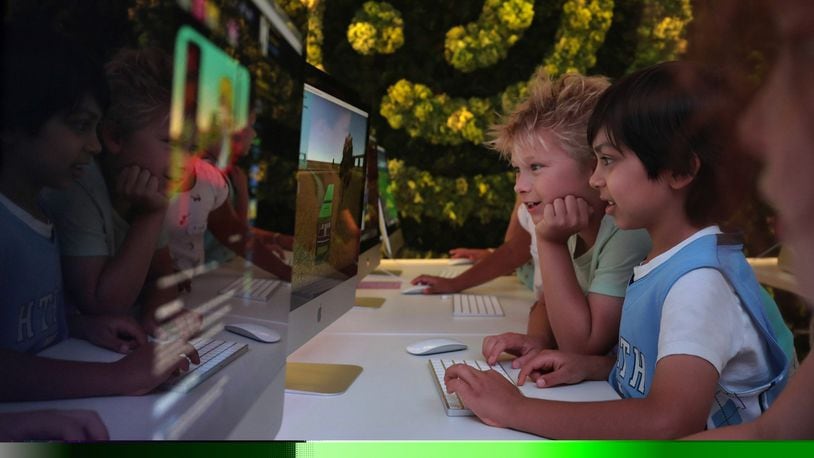 Left, Cillian Rhodes and Shayaan Cleaver work on computers at Codeverse, 815 W. Eastman in Chicago, Ill. on Thursday, Aug. 23, 2018. (Antonio Perez/Chicago Tribune/TNS)