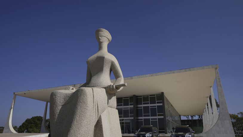 Lady Justice stands outside the Supreme Court in Brasilia, Brazil, Monday, Sept. 2, 2024. (AP Photo/Eraldo Peres)