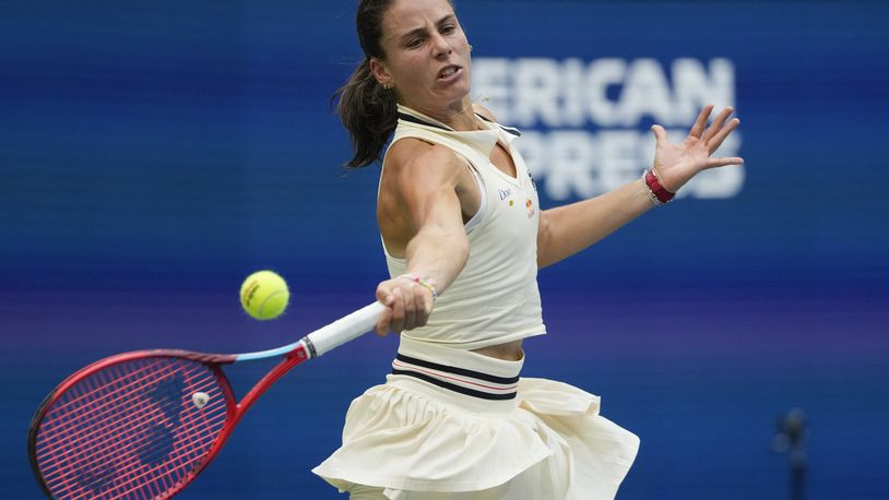 FILE - Emma Navarro, of the United States, returns a shot to Coco Gauff, of the United States, during the fourth round of the U.S. Open tennis championships, Sept. 1, in New York. 2024. (AP Photo/Pamela Smith, File)