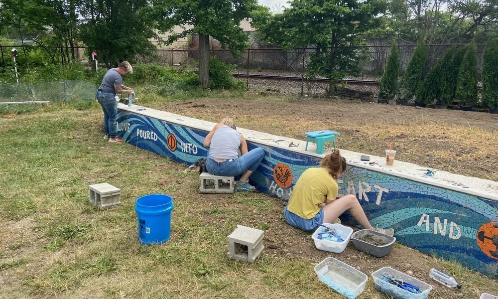 Installation of the Our Town Dayton mosaic project, which will be dedicated June 22. CONTRIBUTED
