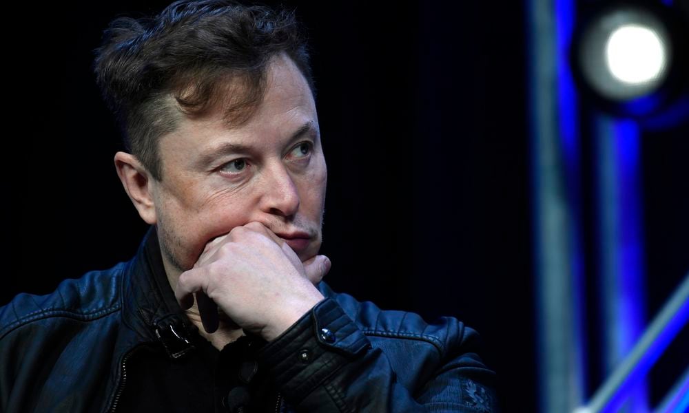 FILE - Tesla and SpaceX chief executive officer Elon Musk listens to a question as he speaks at the SATELLITE Conference and Exhibition in Washington, March 9, 2020. (AP Photo/Susan Walsh, File)