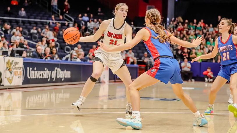 Fort Loramie High School junior Victoria Mescher drives past Convoy Crestview's Ellie Kline during their Division IV state semifinal game on Thursday at University of Dayton Arena. The Redskins won 50-41. Michael Cooper/CONTRIBUTED