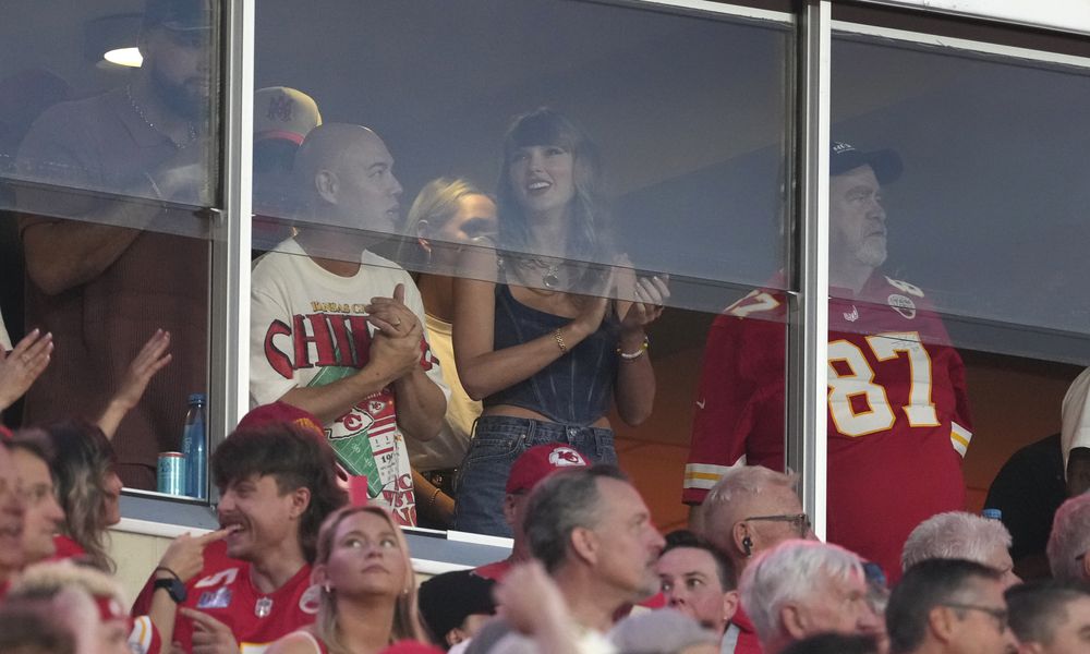 Taylor Swift is seen in a suite before the start of an NFL football game between the Kansas City Chiefs and the Baltimore Ravens Thursday, Sept. 5, 2024, in Kansas City, Mo. (AP Photo/Ed Zurga)