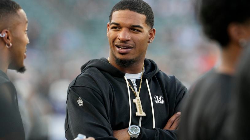 Cincinnati Bengals wide receiver Ja'Marr Chase stands on the field before a preseason NFL football game against the Indianapolis Colts, Thursday, Aug. 22, 2024, in Cincinnati. (AP Photo/Jeff Dean)