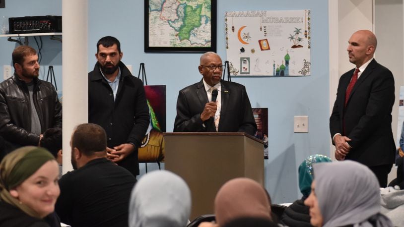 Osman Gazi Mosque held a remembrance of the Soviet government's 1944 forced deportation of Ahiska Turkish people from now modern-day Georgia. Dayton mayor Jeffrey Mims (middle right) along with Dayton city commissioner Matt Joseph (far right) presents a proclamation recognizing the 79th anniversary of those events to Eldar Muradov, president of Osman Gazi Mosque (middle left), and Bayram Gulaliev, a board member of the Osman Gazi Mosque (far left). SAMANTHA WILDOW\STAFF