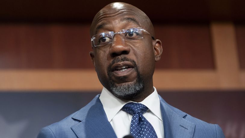 FILE - Sen. Raphael Warnock, D-Ga., speaks at a news conference at the Capitol in Washington on Sept. 12, 2024. (AP Photo/Ben Curtis, File)