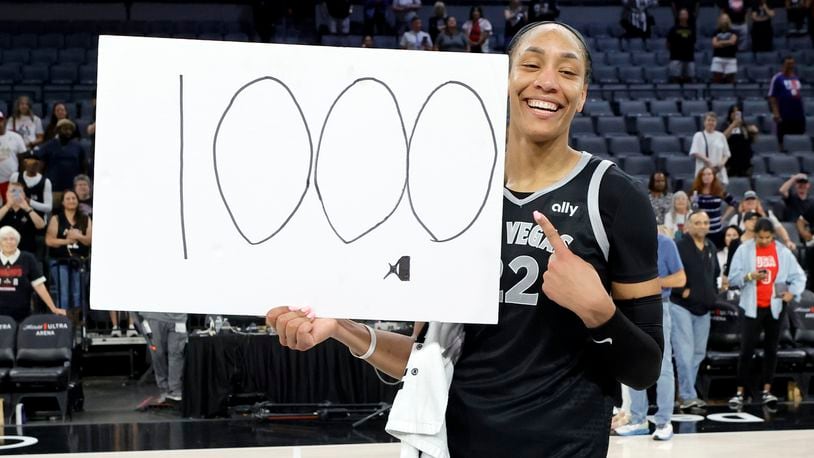 Las Vegas Aces center A'ja Wilson (22) poses after an WNBA basketball game against the Connecticut Sun, Sunday, Sept. 15, 2024, in Las Vegas.(Steve Marcus/Las Vegas Sun via AP)