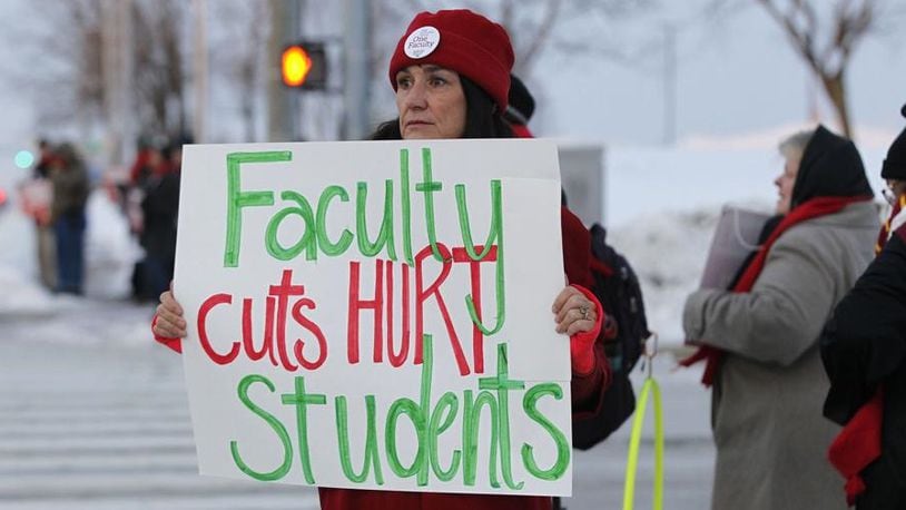 Noeleen McIlvenna, Wright State University history professor and faculty union leader holds a sign during a strike last spring that lasted 20 days.