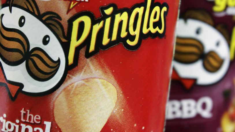 FILE - In this April 5, 2011 file photo, Pringles chips are seen in a posed photo at a West Bath, Maine grocery store. (AP Photo/Pat Wellenbach, File)