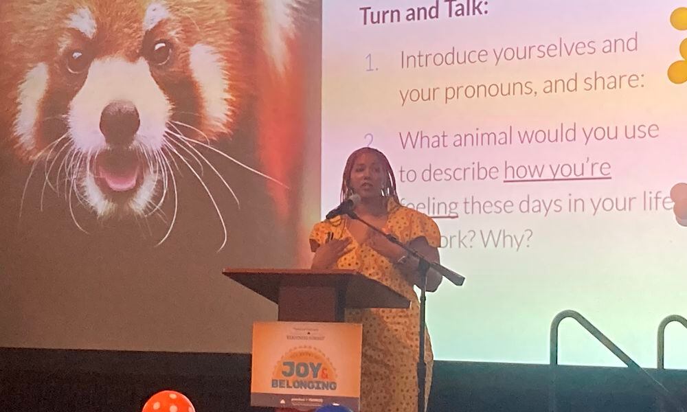 In this file photo from March 2023, Takiema Bunche Smith, founder of Anahsa Consulting, speaks at the 14th Annual Readiness Summit from Preschool Promise and Learn to Earn Dayton. Eileen McClory / Staff