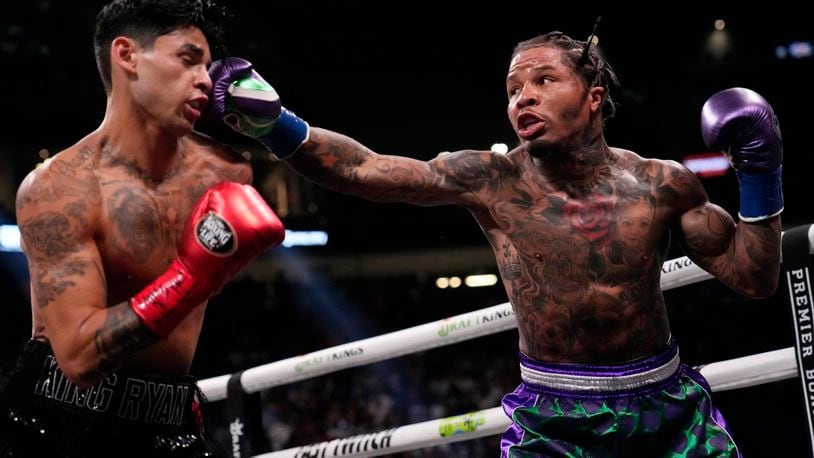 FILE - Gervonta Davis hits Ryan Garcia during a lightweight boxing bout Saturday, April 22, 2023, in Las Vegas. The last time Gervonta Davis was seen in the ring, he had just dismantled Ryan Garcia with a seventh-round knockout. That was more than a year ago. Davis returns Saturday, June 15, 2024, to take on fellow undefeated fighter Frank Martin for the WBA lightweight championship. (AP Photo/John Locher, File)