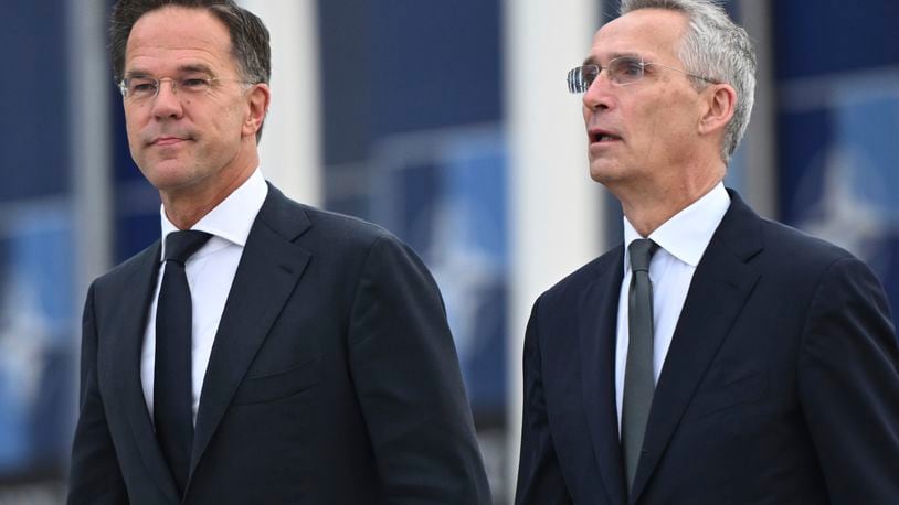 NATO Secretary General Jens Stoltenberg, right, and the incoming NATO Secretary General Mark Rutte arrive for a transition ceremony at NATO headquarters in Brussels, Tuesday, Oct. 1, 2024. (AP Photo/Harry Nakos)