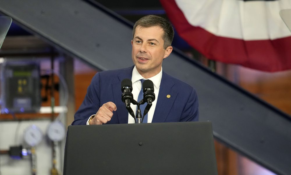 Transportation Secretary Pete Buttigieg speaks before President Joe Biden during a visit to the U.A. Local 190 Training Center in Ann Arbor, Mich., Friday, Sept. 6, 2024. (AP Photo/Paul Sancya)