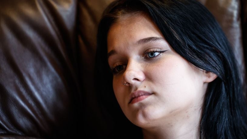 Springboro High School student Rhiannon Price struggled with her metal health. Price is now feeling better and hoping her story will help other teenagers who are struggling. JIM NOELKER/STAFF