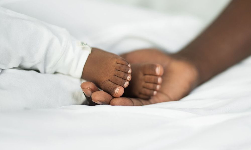 Stock photo of a newborn baby's feet.