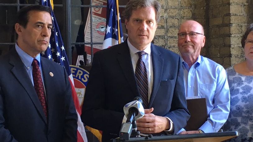 In an August 2016 press conference at the Engineers Club of Dayton, U.S. Rep. Mike Turner, R-Dayton, with U.S. Rep. Darrell Issa, R-California, on his right, said the federal government “picked winners and losers” in shepherding the General Motors bankruptcy. THOMAS GNAU/STAFF