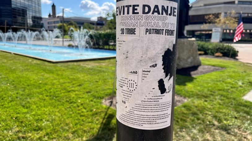 Flyers on the City Hall Plaza in Springfield warn about hate groups. JESSICA OROZCO/STAFF