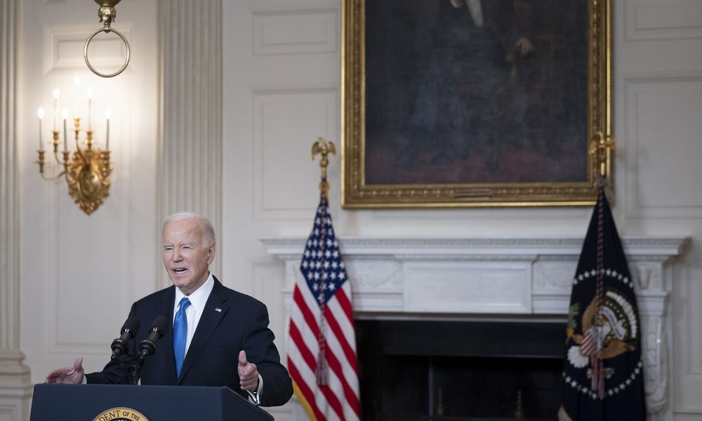  President Joe Biden delivers remarks on the Senate's passage of a security spending bill that would aid Israel and Ukraine at the State Dining Room of the White House in Washington, Feb. 13, 2024. President Biden denounced former President Donald Trump on Tuesday for encouraging Russia to attack some NATO allies, as he implored House Republicans to defy their putative nominee and pass new security aid for Ukraine and Israel. (Tom Brenner/The New York Times) 