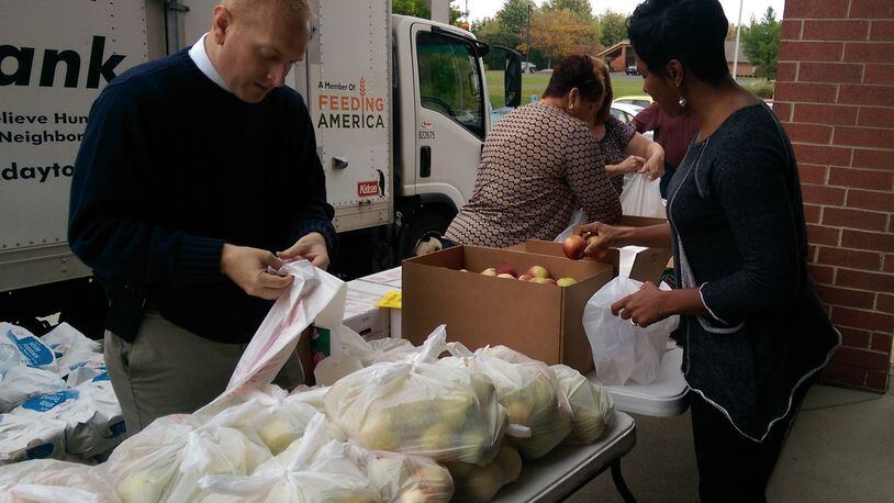 The Foodbank Inc. announces a donation from the Caterpillar Foundation to help fight hunger for more than 120,000 people in the Miami Valley. CONTRIBUTED