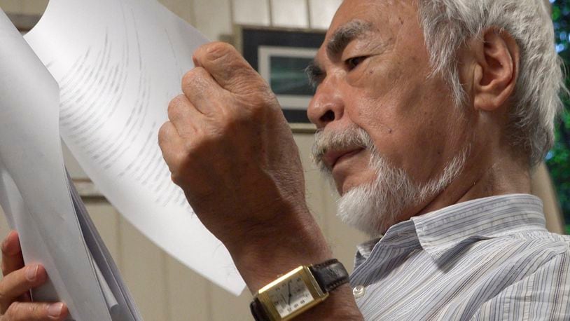 In this undated photo provided by Arai via the Ramon Magsaysay Award Foundation, 2024 Ramon Magsaysay Awardee, Japan's Miyazaki Hayao, reads a script. (Arai/Ramon Magsaysay Awards Foundation via AP)