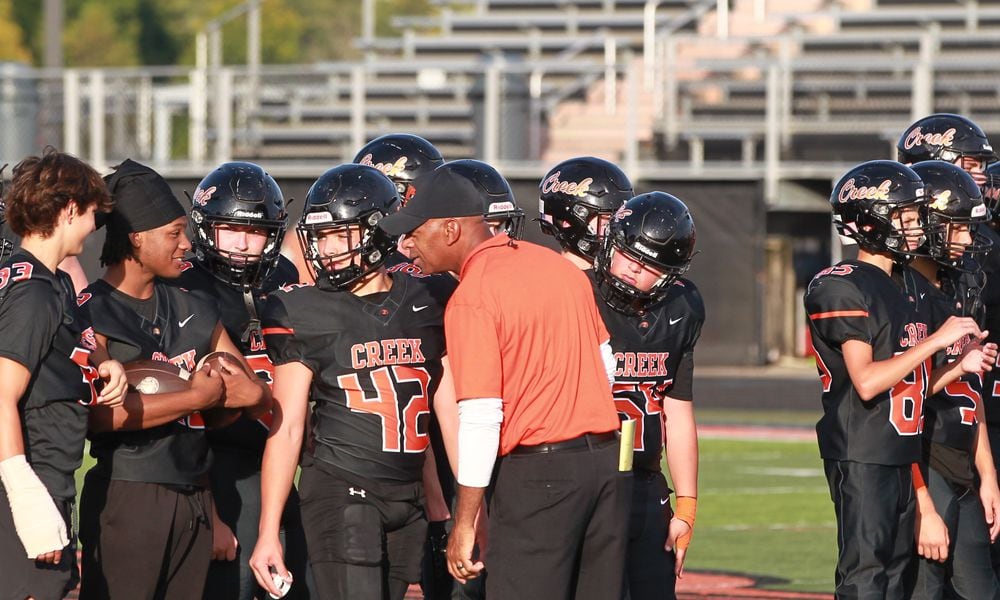 Beavercreek Beavers football coach Trace Smitherman prepares his team to face Northmont on Sept. 13, 2024 in Beavercreek. Marcus Hartman/STAFF