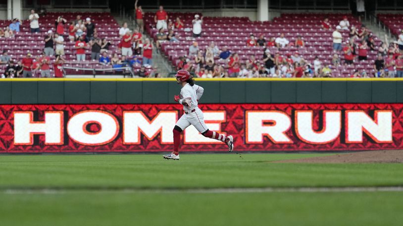 Cincinnati Reds' Jonathan India rounds the bases after hitting a solo home run during the fifth inning of a baseball game against the St. Louis Cardinals, Wednesday, Aug. 14, 2024, in Cincinnati. (AP Photo/Carolyn Kaster)